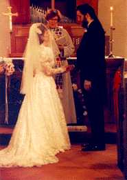 Mike and Kim with Constance at the altar